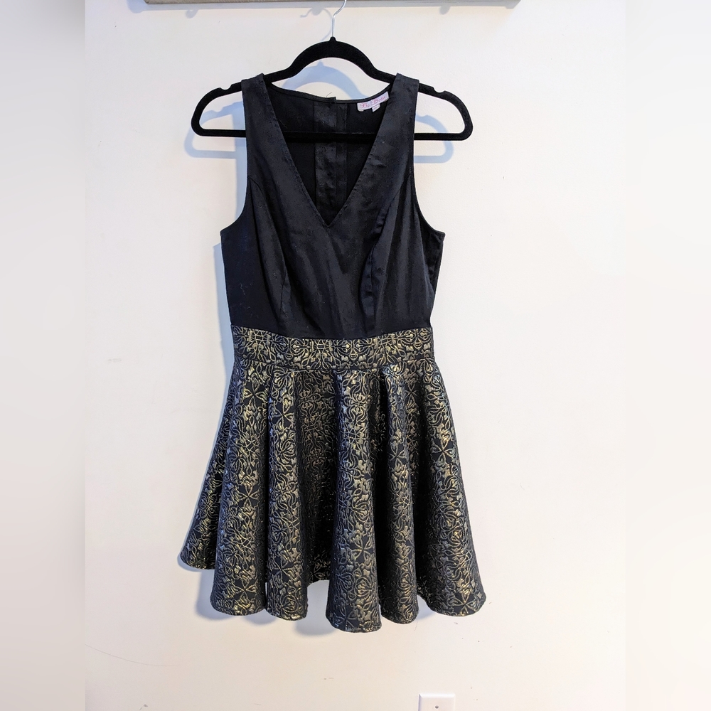 Be Beau, black and gold dress. Size SM/MD